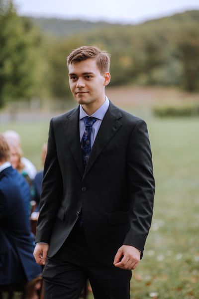 Brian makes his way down the aisle, calm and ready.