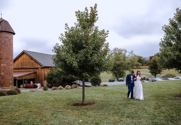 Anastasia and her escort set out from the barn, the brick silo standing watch.