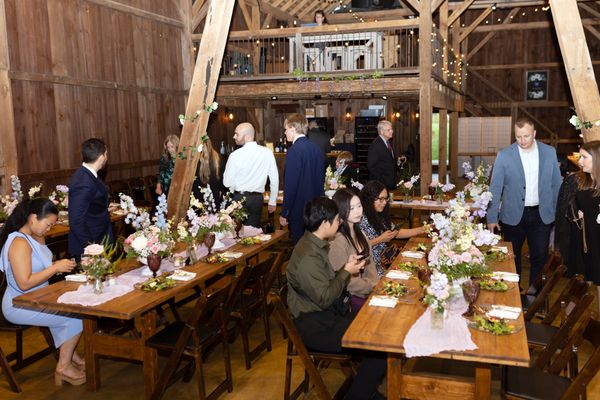 Guests find their seats inside the barn.