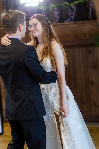 The first dance begins, Anastasia laughing.