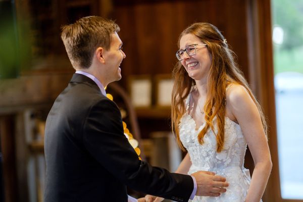 The first dance in the glow of the barn lights.