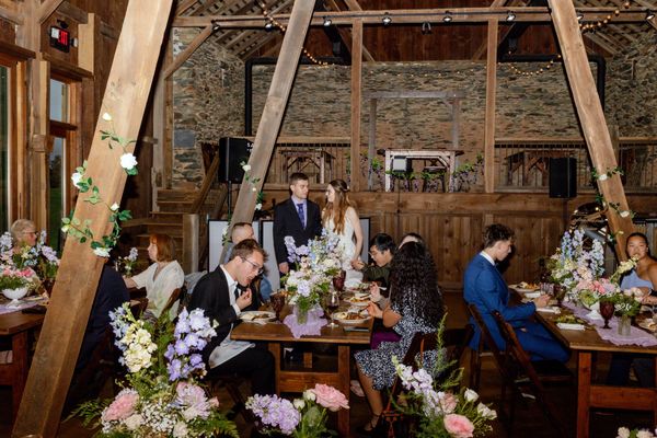 The barn alive with dinner and conversation.